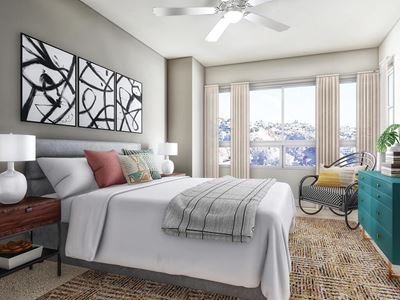 Bedroom with ceiling fan at The Seaton in San Diego, CA